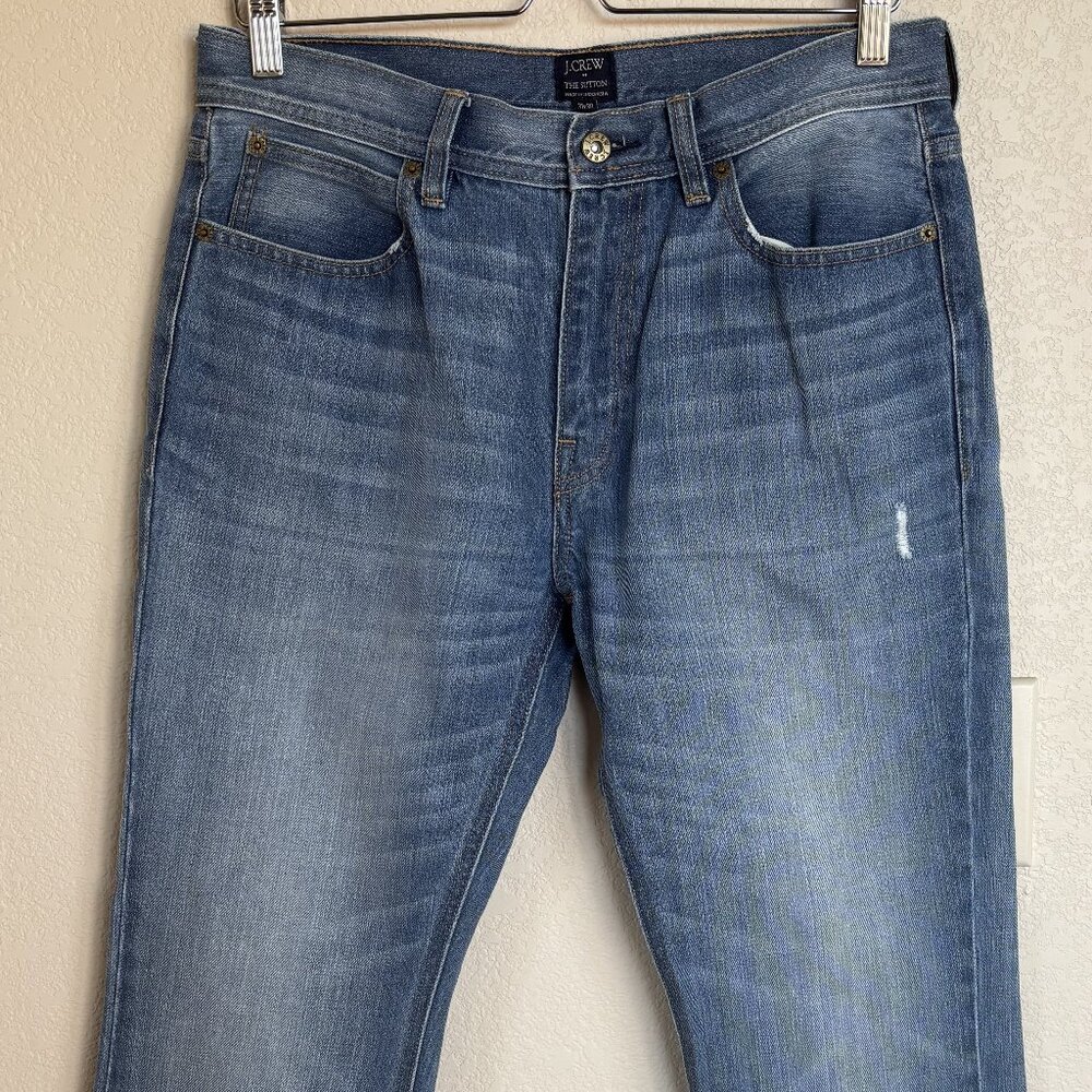 J. Crew distressed faded blue jeans